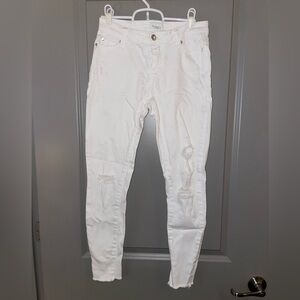 Distressed, white denim jeans